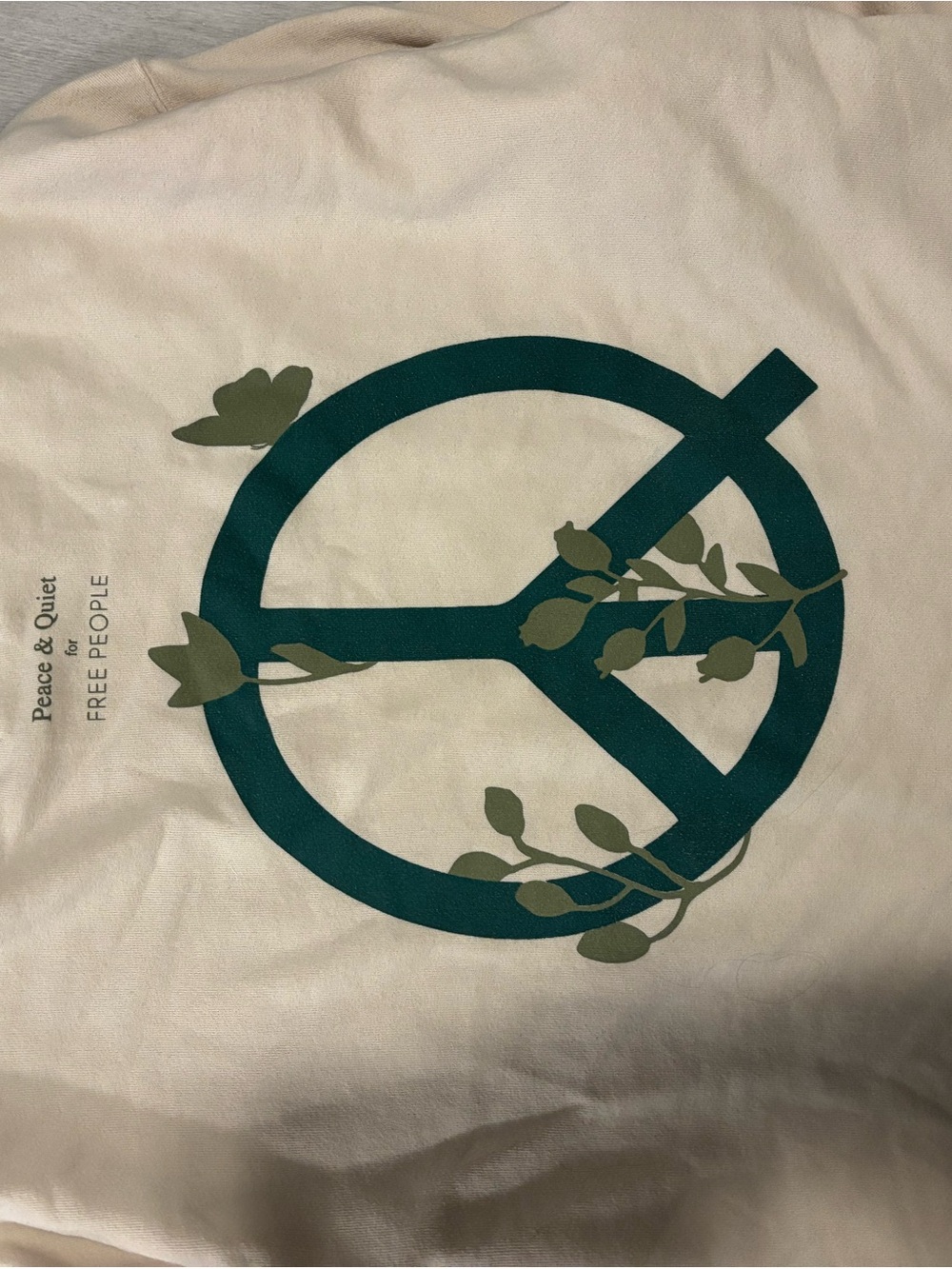 We The Free Cream Tee with Dark Green Peace Symbol and Olive Vines